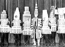 14 * William Van Allen (center) dressed as the Chrysler Building among other architects dressed as their buildings